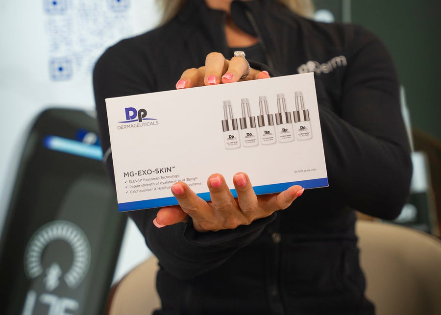 Woman holding a product box with 'Dp' branding in front of a blurred background with text and logos.